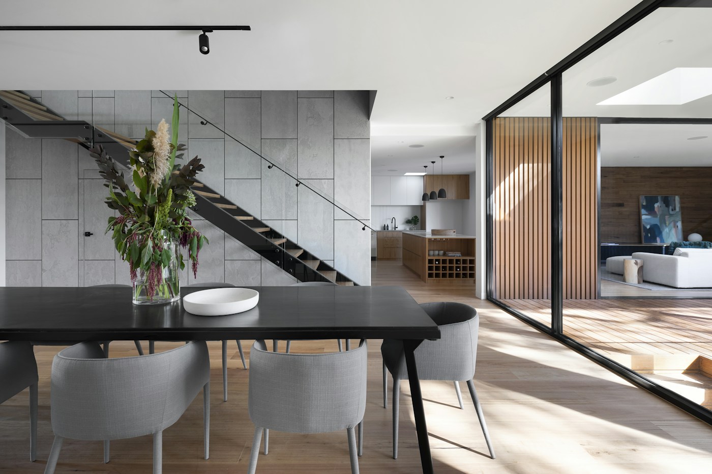 Sunlit contemporary home illustrating a residential lighting project